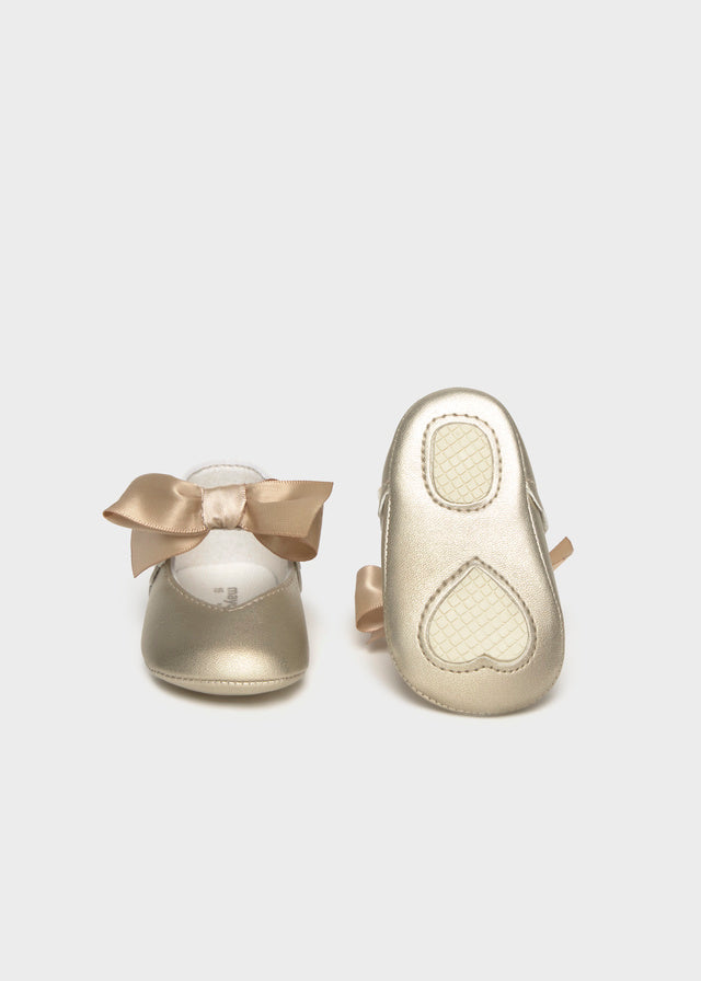 Mayoral baby girls champagne bow pram shoes, front and soft sole view