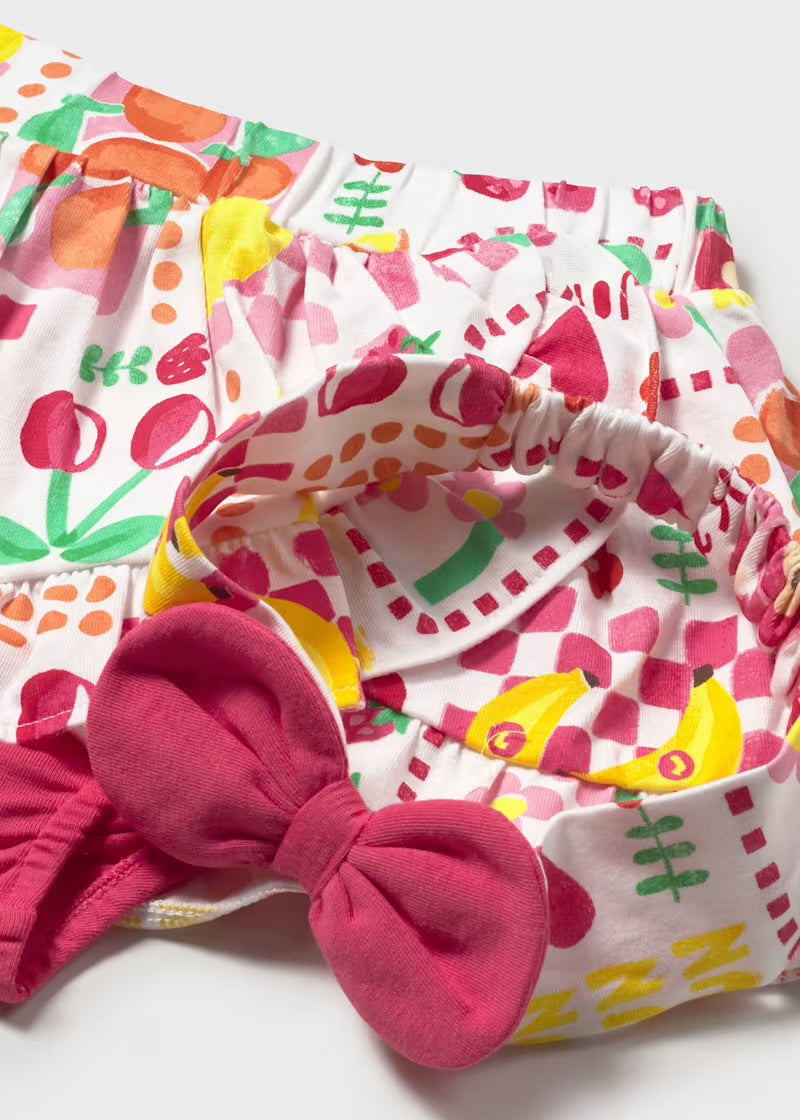 Mayoral girls Hibiscus skirted shorts and matching pink bow headband detail