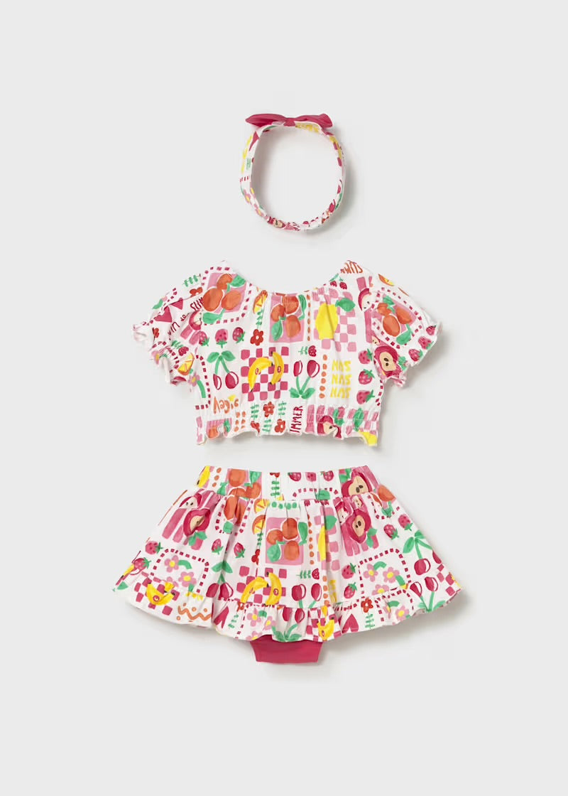 Mayoral girls Hibiscus three-piece top, skirted shorts and headband set, back view