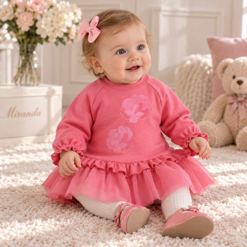 Miranda hot pink girls tulle dress on a 6 month old baby girl