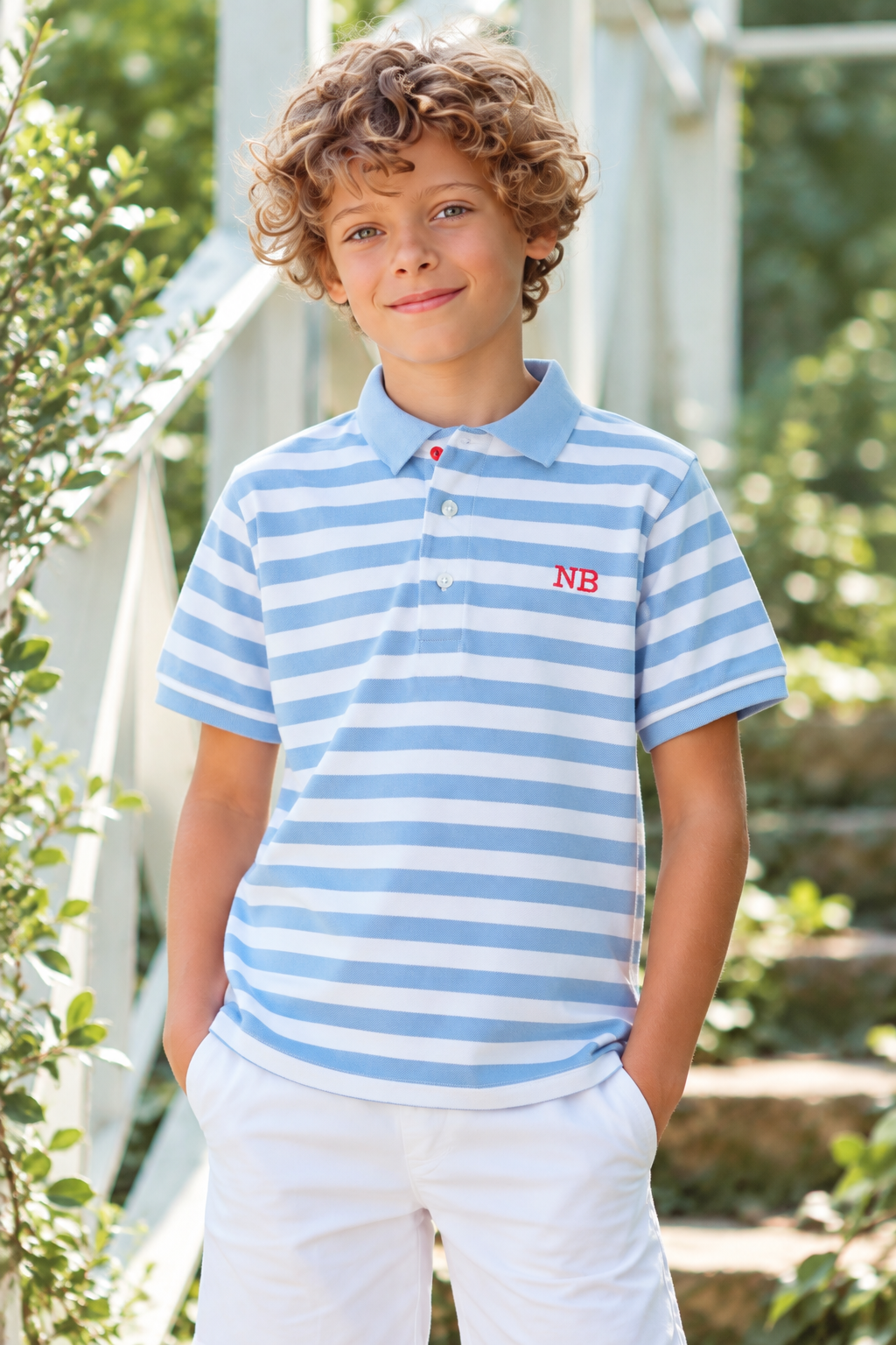 Miranda Nel Blu blue and white stripe boys polo shirt worn with white shorts