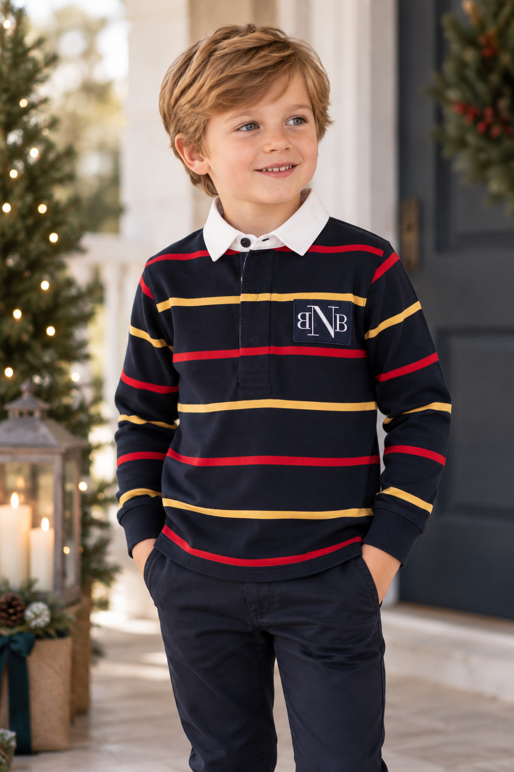 Boy wearing Miranda Nel Blu navy striped long sleeve polo shirt