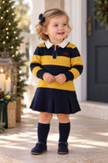 Baby girl wearing Miranda Nel Blu navy and mustard knitted stripe polo dress
