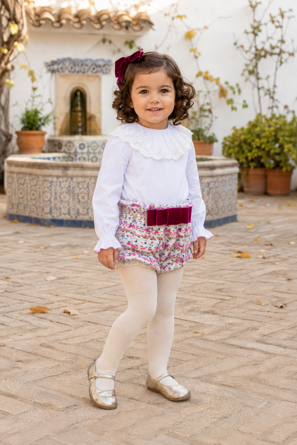 Little girl wearing the Naxos purple tweed jam pant set, angled view