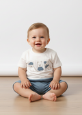 Puppy dog t-shirt and blue textured shorts on a baby boy