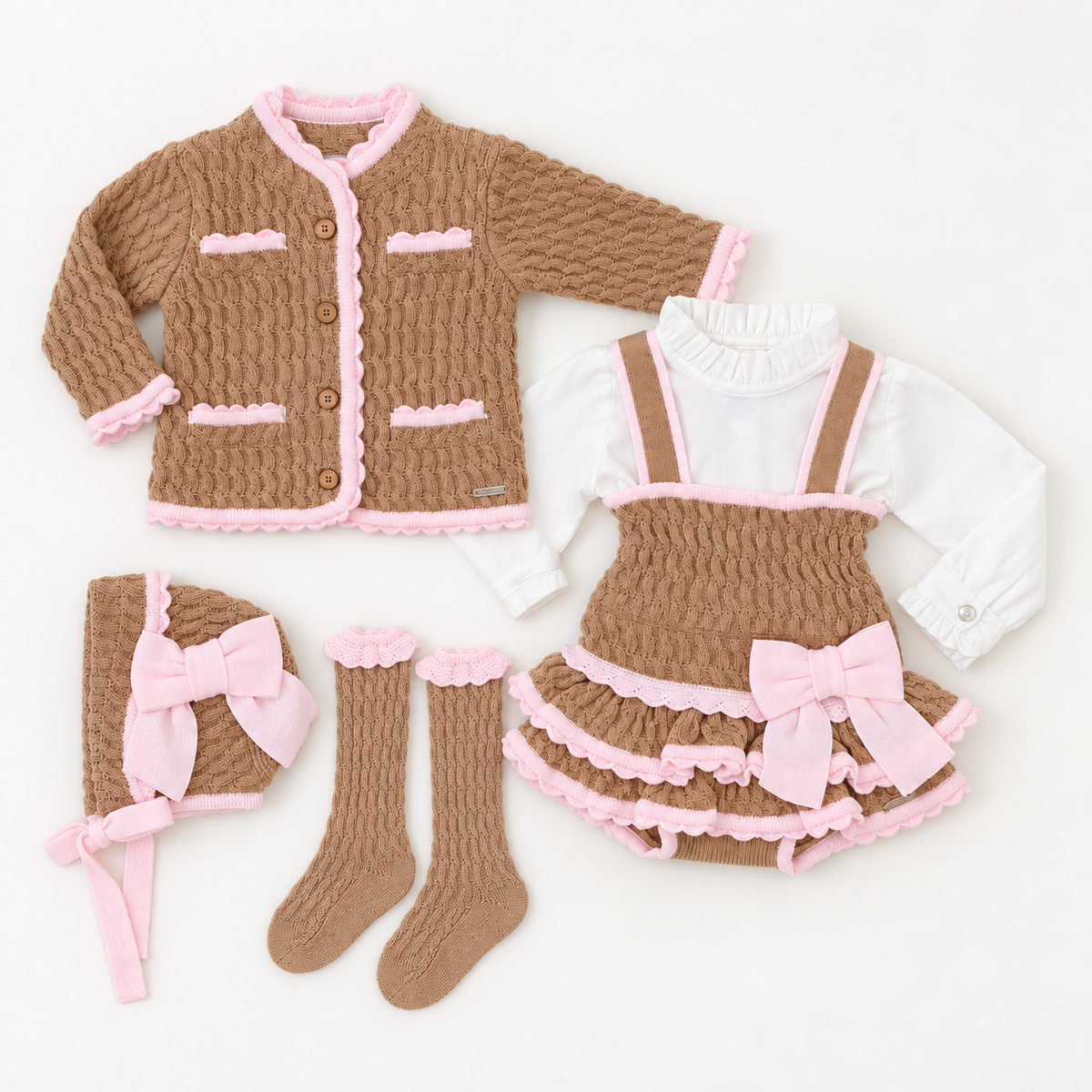 Rahigo girls camel and baby pink five-piece knitted pinafore set with blouse, cardigan, bonnet and matching socks