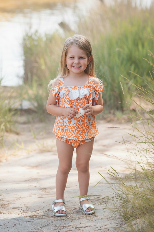 Rochy Majolica girls orange tile print beach set 26902 with ruffle and broderie anglaise detailing