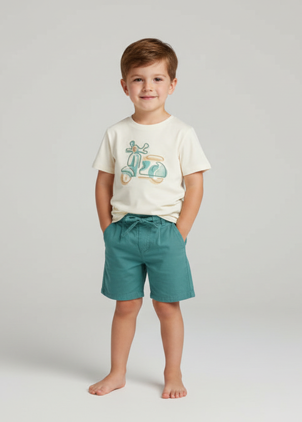 Scooter print t-shirt and teal shorts on a little boy