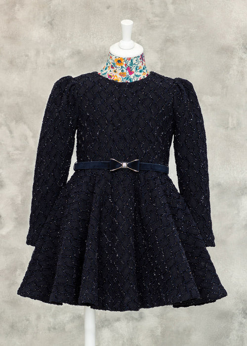 Girl wearing the Abel & Lula navy occasion dress
